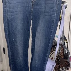Size 10- vintage bootcut jeans with rhinestone designs