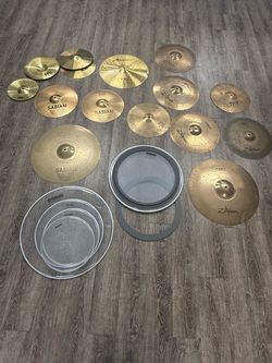 Many cymbals/heads &  pearl dual pedals