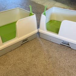 For sale: two gently used cat litter boxes, complete with a handy poop scooper. Both have been thoroughly cleaned and are ready for their next feline 