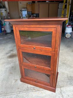 Bassett three shelf cabinet