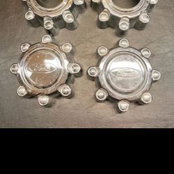 99 TO 04 F250 HUB CAPS