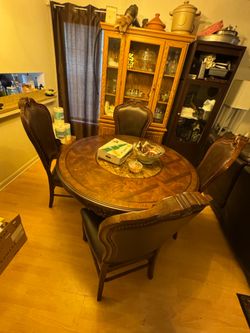Wood table with chairs, rotating marble center in table