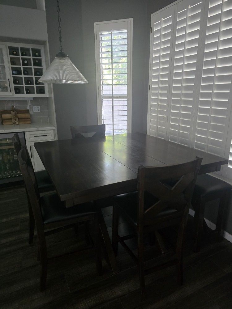 Dark Wood Dining Table And Seating