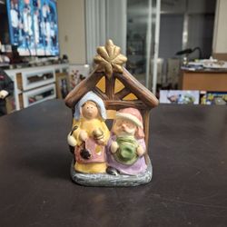 Ceramic Mr & Mrs Claus In Front Of A Church Tower Tealight Holder 5.5"Hx3.5"W