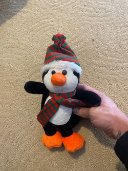 Christmas penguin plush toy stuffed animal. With beanie and scarf