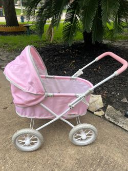 My Baby Doll's Luxury Pram Stroller in pink. With dolls