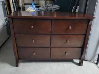 'Delta Children's Furniture'. Nice 6 drawer dark wood dresser.