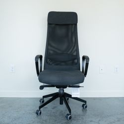 IKEA Markus dark gray fabric office chair with arm rests