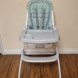 Like New Ingenuity Baby High Chair ( Foldable). Price Firm!