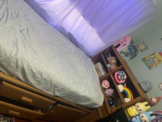 Twin bed with storage and shelves