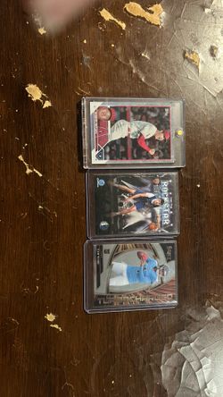 Basketball football and baseball’s cards