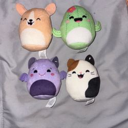 Squishmallows Marvel and two hello Kitty