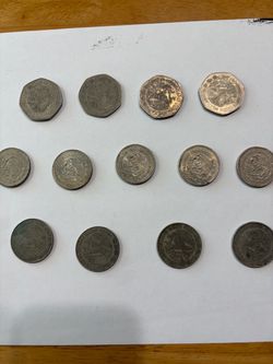 Mexican Peso Coin Lot – 13 Coins plus 3 veinte peso bills and on cincuenta peso I’ll