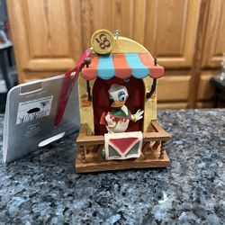 Disney Daisy Duck 85th Anniversary Ornament.  Brand new on original card.  Smoke free home  Will combine listings before purchase to save on shipping 