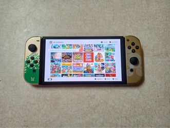 Nintendo Switch OLED + 125 Switch Games and 7500 Retro Games