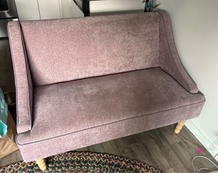 Mauve/light purple small couch