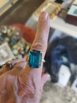 Large Blue stone large ring 1 prong missing  tap on picture to enlarge