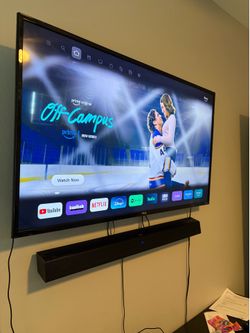 TCL 49-Inch 4K Ultra HD Roku Smart LED TV W/ included Phillips Soundbar and wall mount