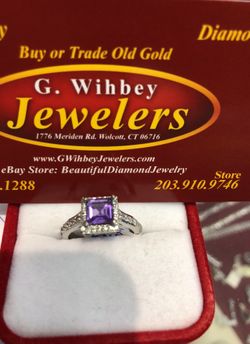 10 kt white gold , diamonds& amethyst ring