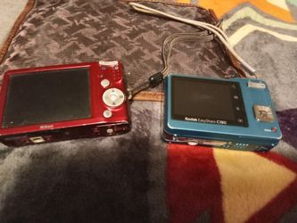 Camera One Kodak And The Other One Nikon $8 Each