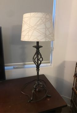 Wrought iron lamp with shade