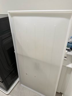 Large plastic floor pan for washer / dryer