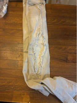 Distressed ripped jeans rockstar original