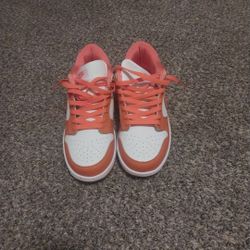 Orange and White nike lows