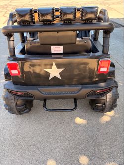 Power wheels jeep lightly used black controller and charger