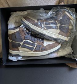 AMIRI Skel Top Hi Brown Black sneakers.