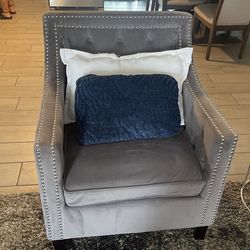 Grey Chairs And Small Middle Table