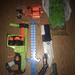 3 NURF GUNS W RELOAD BULLETS AND A MINE CRAFT SWORD $25
