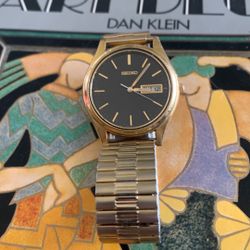 Black And Gold Seiko With Date