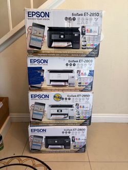 4 empty Epson Ecotank boxes