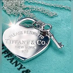 Authentic Tiffany & Co. Silver Heart Stamped Pendant and Key Necklace