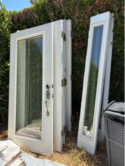 2 BEAUTIFUL DOORS WITH PANELS $75 EACH