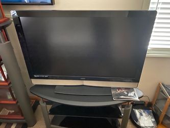 42 inch Vizio LCD TV like new hardly ever used in spare bedroom with TV stand