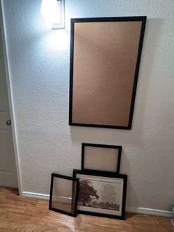 Black picture frames and cork board lot
