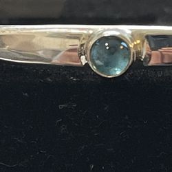 VINTAGE STERLING SILVER BLUE TOPAZ CUFF BRACELET . - SIGNED "JOR"