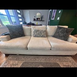 Like new with additional seat cushions sofa for sale