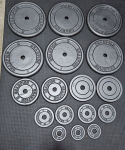 203.75 lbs. Standard 1inch champion plates with curl bar and straight bar
