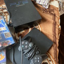 2 Ps2’s With Games 