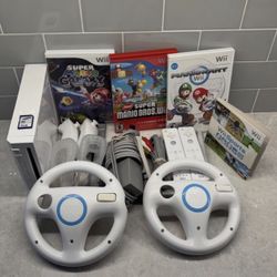 NINTENDO WII BUNDLE with 2 REMOTE and MARIO KART,WII SPORTS,SMASH BROS. MARIO GLAXY 