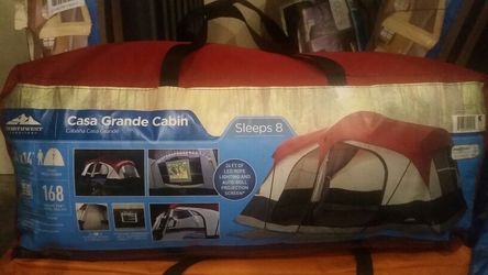 8 person tent with projection screen, 7ft max peek, and room divider