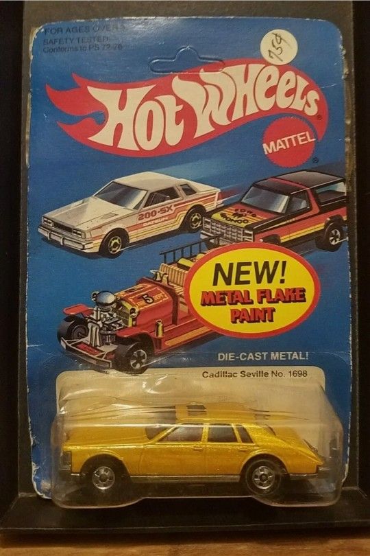 RARE Vintage Hot Wheels Cadillac Seville 1980 GOLD Unpunched Card