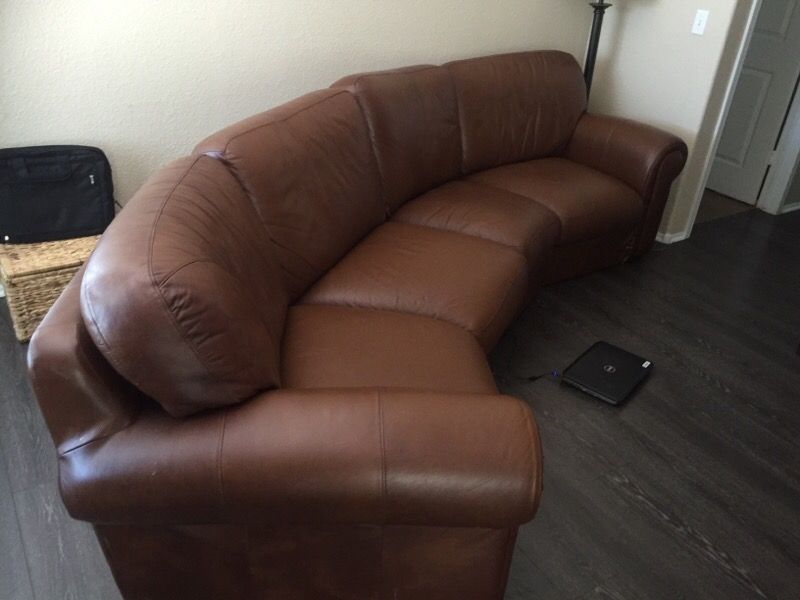 Two piece Brown leather couch - semi circular