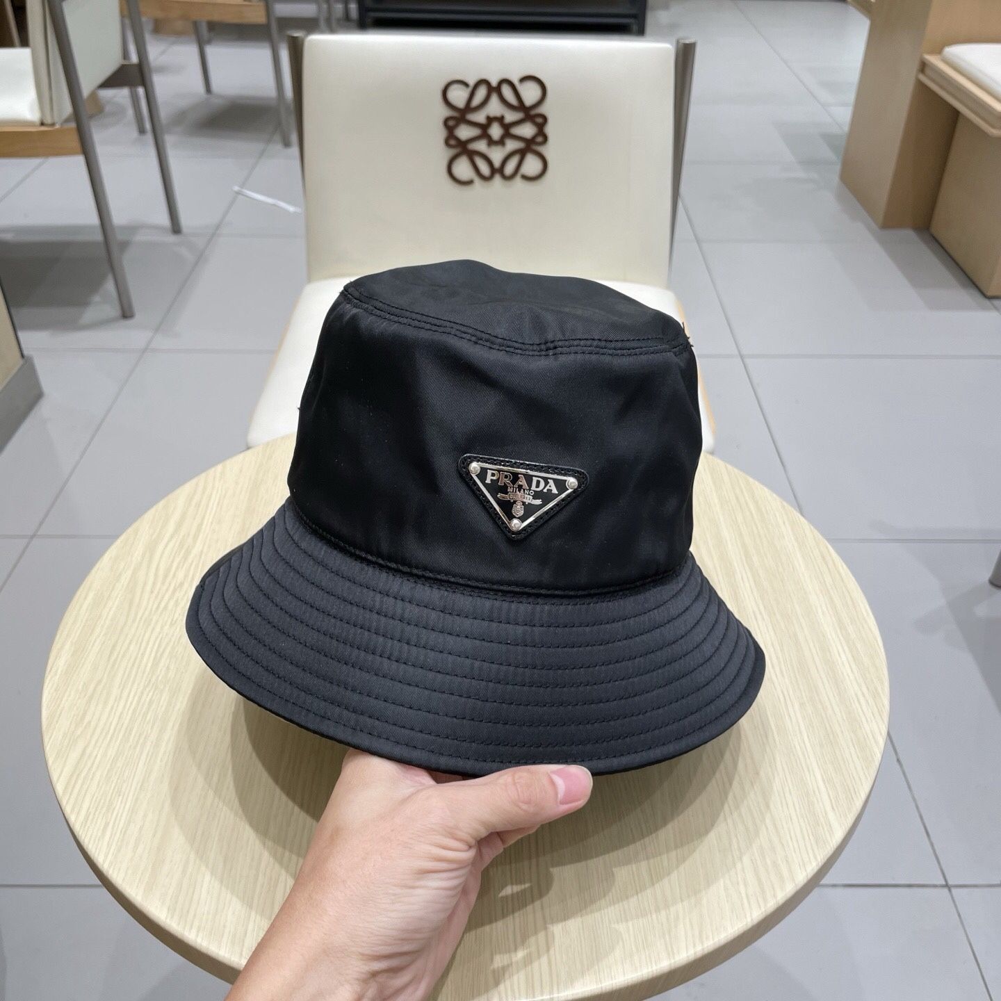 Prada bucket hats