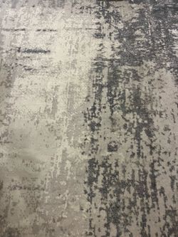 Grey swirl print rug