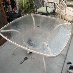 Glass Table With 4 Metal Chairs 