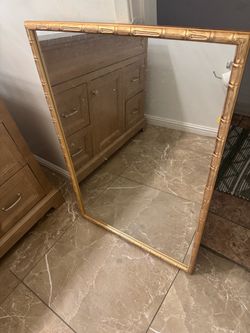 Gold mirror
